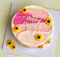 a mother's day cake decorated with sunflowers