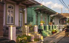 a row of colorful houses on a city street