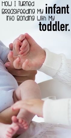 a baby holding its mother's hand with the caption how i turned breastfeeding my infant into bonding with my toddler