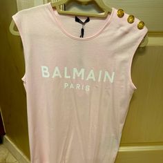 Authentic New With Tags Balmain Three Button Logo Tank. Beautiful Light Pink Color. Size Xs. Reasonable Offers Are Welcome. Thank You For Looking At My Listing :) Designer Summer Tops With Buttons, Luxury Buttoned Tops For Spring, Luxury Spring Tops With Buttons, Luxury Summer Top With Button Closure, Balmain Top, Coin Logo, Button Logo, Tie Dye Cotton, Black Tie Dye