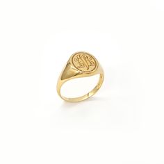 This dainty personalized oval ring is made of solid gold. You can engrave your favorite monogram as all letters (numbers, symbols,e.t.c) are available, and create your custom signet ring. Traditionally, signet rings are worn on the pinky finger of your non-dominant hand. Nowadays, you can wear our oval ring on any finger, and take the classic monogram style to the next appealing level! You can wear it plain or engrave it with your favorite letter or number. The possibilities to engrave it are en Monogram Ring Gold, Custom Signet Ring, Pinky Finger, Numbers Symbols, Classic Monogram, Letter Ring, Monogram Ring, Signet Rings, Gold Monogram