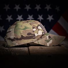 MULTICAM FULL FABRIC AMERICAN FLAG RANGE HAT 🇺🇸 Made In The USA A must-have for range days, our range hats are built for shooters. The MultiCam ripstop fabric will protect your head from sharp brass while the buttonless crown will not interfere with ear protection or cause head pain. Vintage washed for that worn-in look and feel, our full fabric MultiCam range hat is embroidered with an American flag on the front and our logo over the left ear. We partner with a multi-generational family-owned Head Pain, Heather Green, Ear Protection, Ripstop Fabric, White Mesh, Hat Making, Ball Cap, American Made, Your Head