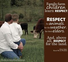 two people sitting in front of a sign that says respect for the animals, and above all, respect for the land