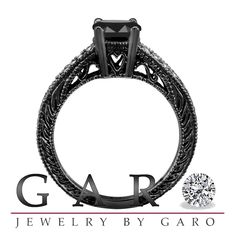 a pink diamond ring with the words gar written in black and white lettering on it