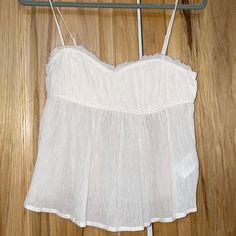 Brand New, With Tags, Never Worn. Light Pink Flowy Top. Size Medium Perfect For The Summer ! Pink Urban Outfitters Tank Top For Spring, Urban Outfitters Pink Tank Top For Spring, Urban Outfitters Summer Daywear Tops, Feminine Tops By Urban Outfitters For Day Out, Feminine Urban Outfitters Top For Day Out, Urban Outfitters Sleeveless Summer Camisole, Urban Outfitters Sleeveless Camisole For Summer, Spring Feminine Tops From Urban Outfitters, Urban Outfitters Spaghetti Strap Tops For Summer