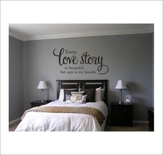 a bedroom with a bed, nightstand and wall decal that says every love story is beautiful but ours as many favorites