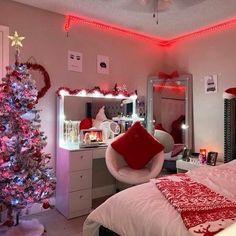 a bedroom decorated in pink and red for christmas