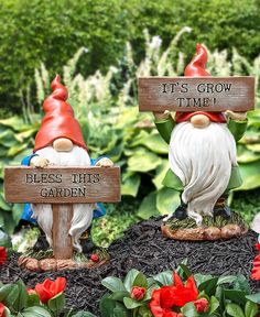 two garden gnomes holding signs that say it's grow time and bess this garden