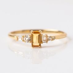 Natural Citrine Ring-Dainty Citrine Ring-Cirtine Stacking Ring-Sterling Silver Ring-Baguette Citrine Ring-14k Gold Ring-Birthstone Ring --->Ring details: - Theme: Dainty, Stackable & Engagement - Metal Type: Sterling Silver, 14K White Gold,14K Rose Gold,14K Yellow Gold - Main Stone: Citrine (Baguette Cut) - Stone size: 3.7x6 mm - Color: Yellow - Weight: 1.55 gram approx (Note:- Weight can be more or less according to the size of the ring) - Ring Size: I offer more than one (Contact us if your ring size is not available in the listing) Makes a Wonderful Gift for your Girlfriend, Wife, Mom or Simply an Excellent Addition to Your Jewelry Collection ---> ❥ STYLE STATEMENT This ring would be perfect to match up with any of your attires. These will surely add more oomph to your outfits. ---> 🎁 Yellow Citrine Engagement Ring, Engagement Ring Quiz, Citrine Engagement Ring, Asymmetrical Ring, Citrine Ring Engagement, Promise Rings Vintage, Local Eclectic, Engagement Ring Art Deco, Citrine Jewelry