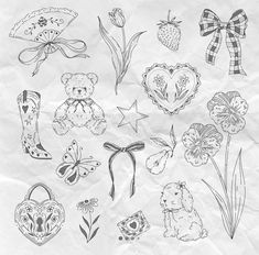 a bunch of drawings that are on top of a piece of paper with flowers and hearts