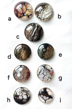 six different types of glass cabochons on a white surface with the letters abc, c, d, e and f