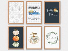 six pumpkins are hanging on the wall in front of some framed pictures with autumn sayings