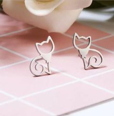 available in silver and gold total height is 1.3 cm * free of lead, nickel, and cadmium Cat Stud Earrings, Hollow Earrings, Cat Earrings Studs, Simple Stud Earrings, Mini Studs, Silver Cat, Tiny Studs, Tiny Earrings, Jewelry Style