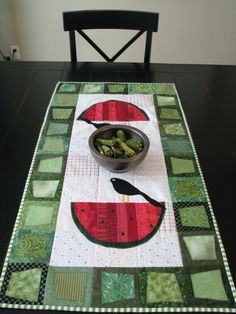 a table with a bowl of food on top of it