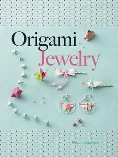 the cover of an origami jewelry book, with earrings and butterflies on it