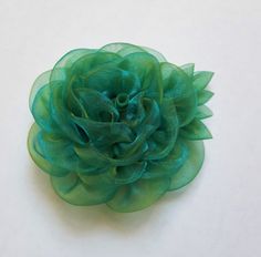 This gorgeous brooch is made of organza fabric in emerald green color. Is a great jewelry, on the back is a brooch pin. Flower-diameter approx. 7 cm. Cheap Green Flower Brooches, Brooch Wedding, Emerald Green Color, Dragon Necklace, Organza Fabric, Pearl Headband, Beading Wire, Button Flowers, Head Shapes