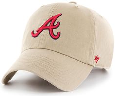 the atlanta braves'47 clean - up hat is tan with red and blue embroidered on it