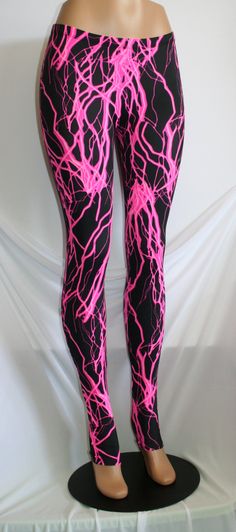 LIGHTNING BOLT / STORM LEGGINGS Awesome Fabric - Glows Under Blacklight!! 5 Dazzling Colors!! Matching Top Available Also! CUSTOM REQUESTS: All items can be adjusted to your needs!! → Waist higher/lower, inseam longer/shorter, different fabric, style or color → If you need help with sizing, send me a message with your measurements: Bust / Waist / Hips / Girth → We custom make many different styles in all sizes!! * Toddler, Child, Women, Men, Plus Size * Shorts, Tops, Leggings, Skirts, Leotards, Black Stretch Leggings For Cosplay, Stretch Pink Rave Bottoms, Thigh High Fitted Leggings For Cosplay, Fitted Thigh-high Cosplay Leggings, Fitted Thigh High Leggings For Cosplay, Pink Stretch Rave Bottoms, Fitted Pink Bottoms For Cosplay, Lightning Leggings, Storm Lightning