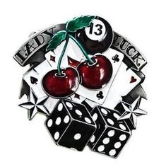 two cherries are on top of dices with the number thirteen in it's center