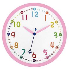 a pink clock with numbers on the face and hands is in front of a white background