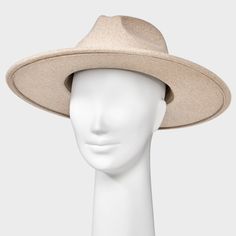 Give your hat collection a chic, versatile update with this Wide-Brim Fedora Hat from Universal Thread™. Made from woven recycled polyester fabric, this fedora hat is designed with a wide brim that measures 22.5 inches in circumference. Great for accenting a wide variety of outfits, it also offers an adjustable fit with the hook-and-loop fastener. Universal Thread™: Found exclusively at Target. Lightweight Flat Brim Solid Hat, Solid Color Lightweight Hat With Flat Brim, Lightweight Solid Color Flat Brim Hat, Solid Color Lightweight Flat Brim Hat, Classic Lightweight Fedora With Flat Brim, Lightweight Beige Fedora With Flat Brim, Lightweight Wide Brim Fedora, Lightweight Fedora With Curved Brim, Trendy Beige Fedora With Curved Brim