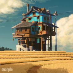 a large house sitting on top of a hill in the middle of a wheat field