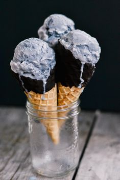 three scoops of ice cream in a glass jar