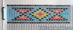 a cross stitch bookmark with an image of a diamond pattern on the front cover