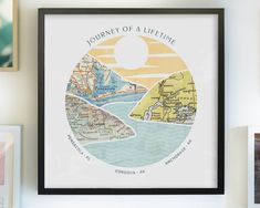 a framed map with the words journey of a life time on it in front of some pictures