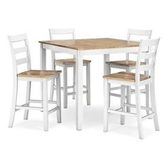 a white table with four chairs and a wooden dining set on top of the table