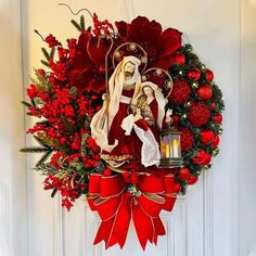 a wreath with a virgin mary on it