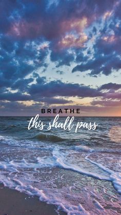 the words breathe, this shall pass are in front of an ocean with waves and clouds