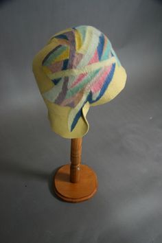 Sonia Delaunay Cloche | France, Art Deco | Golden beige fur felt cloche with abstract felt design hand stitched on the inside and not visible on the outside in pink, yellow, mauve and orange hues | This is a true work of cubist art and a treasure Mauve And Orange, Felt Design, Felted Hat, Cloche Hats, Art Deco Art