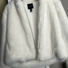 Never Worn. White Semi Cropped Stylish And Chic Fur Coat. Perfect For Winter Layering. Says It’s A Large However I’m A Small And It Fits Me Oversized Perfectly So Any Size Xs - Large Will Work Old Money, Chic, City Chic, Stylish, Gala Forever 21 Long Sleeve Cropped Jacket For Winter, Forever 21 White Winter Outerwear, Forever 21 White Outerwear For Winter, Forever 21 White Trendy Outerwear, Trendy White Outerwear From Forever 21, Chic White Forever 21 Outerwear, Forever 21 Fitted Winter Outerwear, Chic Workwear Outerwear From Forever 21, White Long Sleeve Outerwear By Forever 21