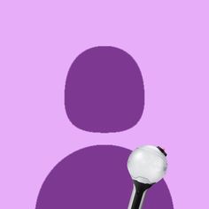 a black and white toothbrush on a purple background