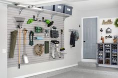 there is a garage with several tools hanging on the wall