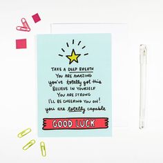 a greeting card with an image of a star and the words good luck on it