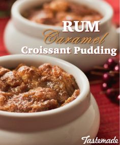 two white bowls filled with croissant pudding on top of a red table cloth