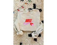 Valentine's Day Brand Embroidered Sweatshirt If you wish another color besides our color chart, you can note on Order Notes at checkout.  We do not accept returns or exchanges, but please message us if anything is wrong with your order! 📌 PRODUCT DESCRIPTION 📌SIZE:For the detailed sizing information, please check out the sizing chart under the photos to find the right size for you! All sweatshirts are adult unisex. If you have any questions on sizing, please contact me before placing your orde Stitch Sweatshirt, Valentine Embroidery, Embroidery Gifts, V Day