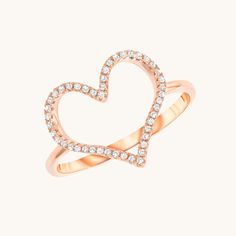 a heart shaped ring with diamonds on it