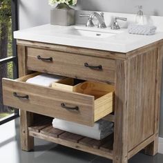 a bathroom vanity with two drawers and a sink