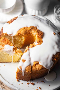 Mile high golden pound cake with vanilla glaze on top.