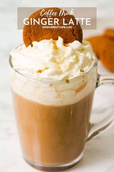 coffee drink with whipped cream and ginger latte in the middle, topped with a cookie