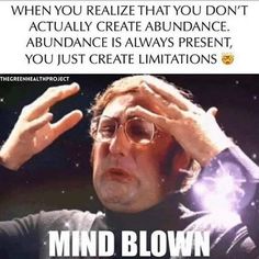 a man holding his hands up to his face with the words mind blown on it