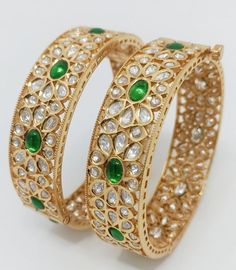 Uncut polki kundan openable bangle/bracelet/ kada in Gold finish with Emerald green stones. Price is for pair. Size 2-4 (2.25in diameter), 2-6 (2.375in diameter) and 2-8 (2.5in diameter) available. Please state size in checkout. Luxury Ceremonial Bangle With Stone Work, Ceremonial Kundan Fusion Bangle, Ceremonial Fusion Kundan Bangle, Fusion Style Cutdana Bangle For Festivals, Festive Fusion Openable Bangle, Traditional Green Bangle Cuff Bracelet, Fusion Kundan Bangle For Celebration, Fusion Style Meenakari Bangle For Celebrations, Green Meenakari Bracelets For Celebration