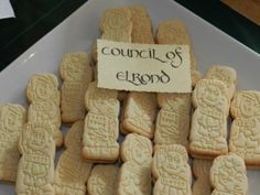 a plate full of cookies with writing on it that says council of elrond