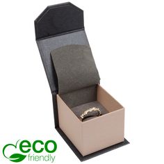 an open box with a ring in it on a white background that says eco friendly