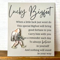 a card with an image of a little boy on it and the words lucky bigfoot