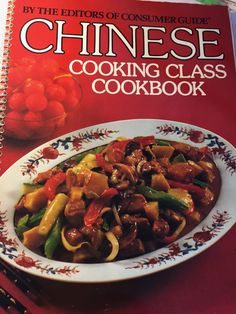 a cookbook with chinese cooking class on it