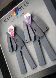 the paper cutouts are made to look like men's ties